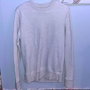 White Goodfellow & Co crewneck. The inside is fuzzy and soft. Worm once.